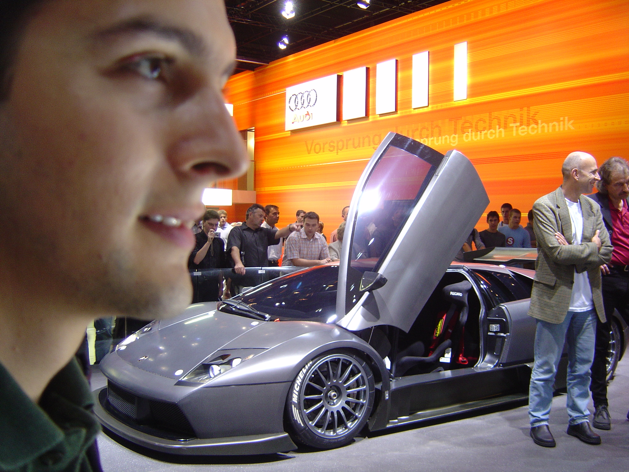 Young Nicolás with a Lamborghini Murciélago